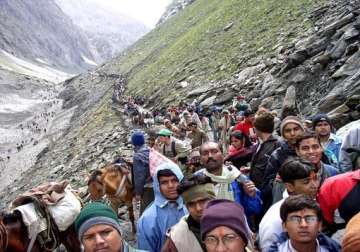 amarnath yatra begins in tight security inclement weather