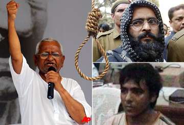 anna hazare demands public hanging of afzal kasab