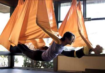 anti gravity yoga becomes the latest fitness trend in us