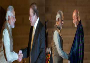 as pm modi has brief exchanges with saarc leaders