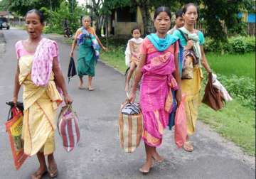 assam killings relatives agree to cremate baksa victims