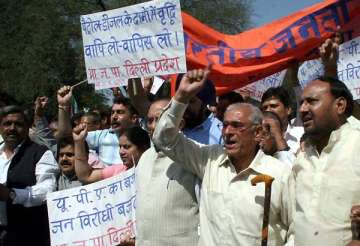 bjp activists hold protests against petrol hike