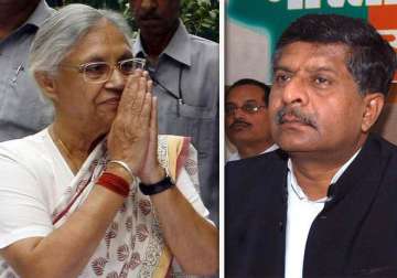 bjp demands sheila s exit says pmo involved