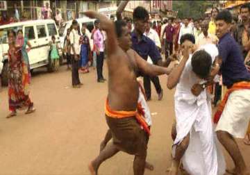 backward class leader bashed up in mangalore for opposing ritual of rolling on brahmins leftover food