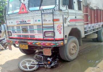 biker dead after collision with truck