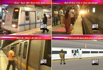 boy trapped in delhi metro doors mom falls on track