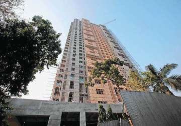 cag slams army officials for adarsh housing scam