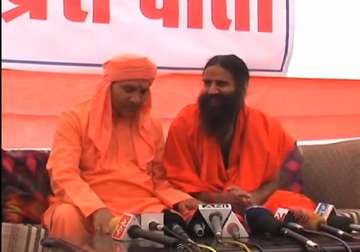 caught on camera ramdev discussing money with bjp candidate