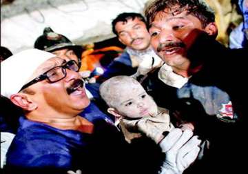 child recovered from under thane rubble opens eyes