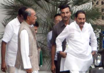 cong leaders adopt three resolutions on telangana seek cm s resignation