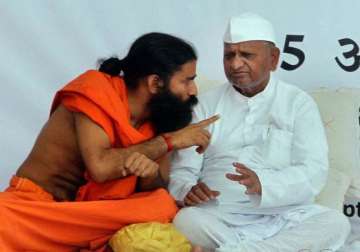 cong hits back at hazare ramdev bjp launches campaign