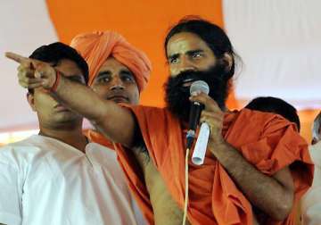 congress is a sinking ship says swami ramdev