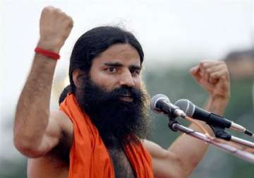 court reserves order on plea against ramdev s remarks on sonia