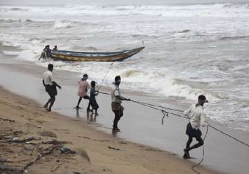 cyclone phailin over 5 lakh evacuated in odisha and andhra 5 killed