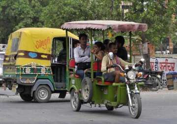 delhi hc agrees to review its order to ban e rickshaws