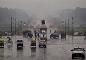 delhi lashed by thunder shower