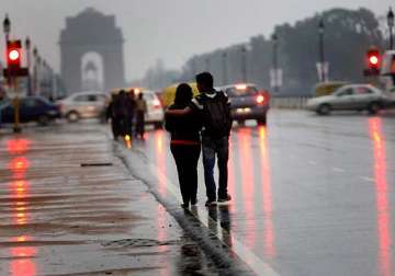 delhi temperature dips with rain