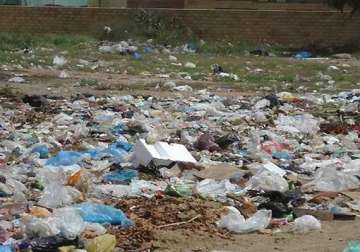 despite ban plastic bags add to delhi s pile of waste