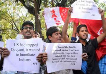 devyani khobragade rpi activists vandalize domino s outlet in mumbai