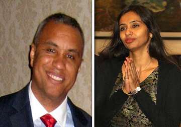 devyani khobragade spat nypd officer arrested at igi airport