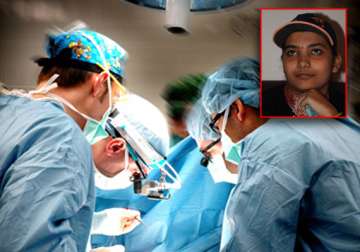 doctors perform rare surgery with patient remaining awake