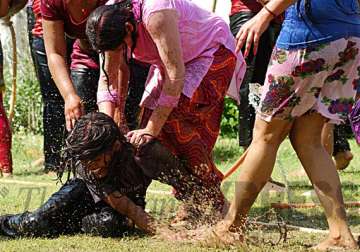 drenched in colours delhi celebrates holi