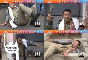 drunk jharkhand police sub inspector creates scene in dhanbad