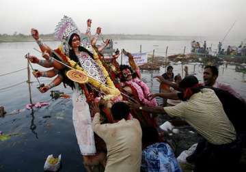 durga puja ends in bengal with idol immersion