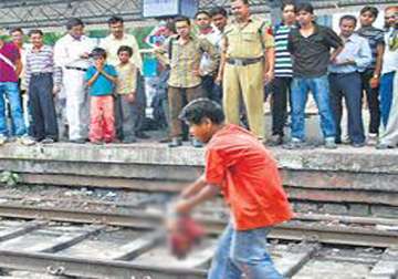 earphones plugged in boy run over by train