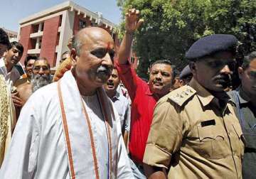 evict muslims from hindu areas togadia spews venom