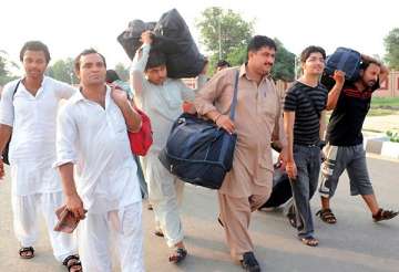 exodus continues 171 hindus arrive from pakistan seek refuge in india