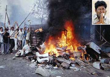 face of 2002 riots wants ban on the use of his picture