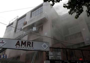 family members vandalize amri hospital reception in kolkata