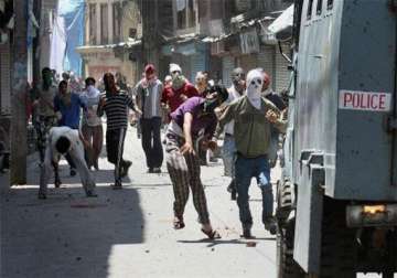 four cops injured in stone pelting by mob in gujarat