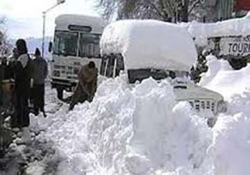 fresh snowfall blocks two highways to kedarnath badrinath