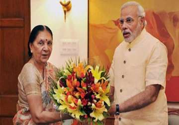 gujarat cm thanks pm for increase in height of narmada dam