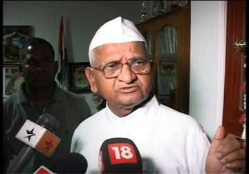 hazare condemns blackening of sonia s poster