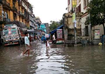 heavy torrential rains throw life off gear in kolkata