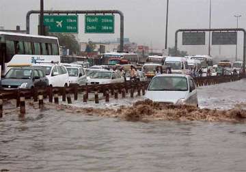 heavy rains lash delhi waterlogging and traffic jams