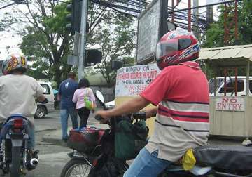 helmet must for bikers to get petrol from pumps in gurgaon