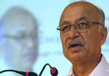 home minister shinde in us as maoists go on killing spree in chhattisgarh