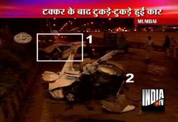 hyundai sonata car at 150 kmph hits divider breaks into two in mumbai two persons critical