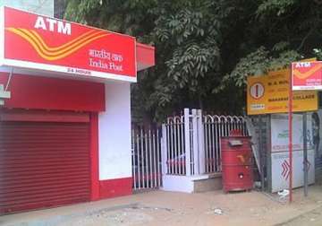 india s first post office savings bank atm in chennai