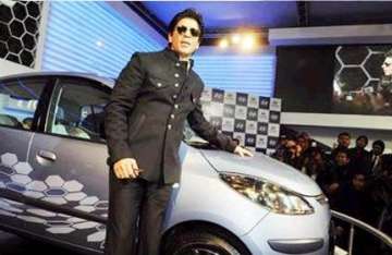 bollywood stars add glitz to auto expo 2010