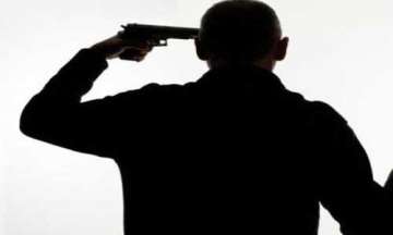 debt ridden farmer commits suicide by shooting himself