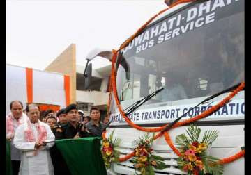 tarun gogoi inaugurates guwahati dhaka bus service