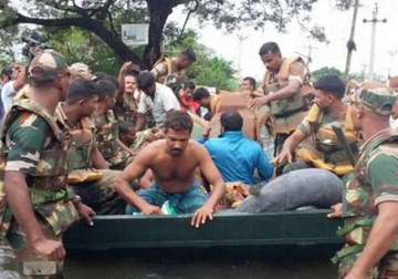 rain fury leaves chennai marooned army navy rescue stranded people