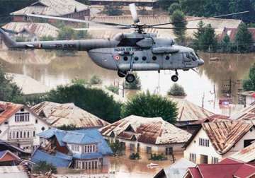kashmir floods security forces hit hard as hundreds of rifles bombs still submerged