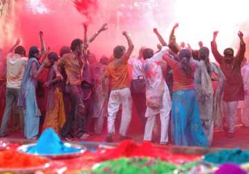 colours rule streets as people celebrate holi