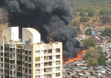 two killed 11 hurt in mumbai slum fire